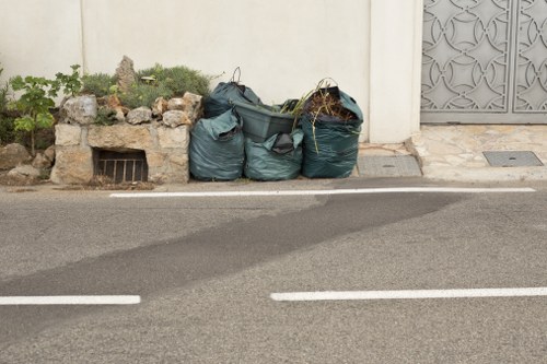 Crew carrying furniture from a mid-size house clearance